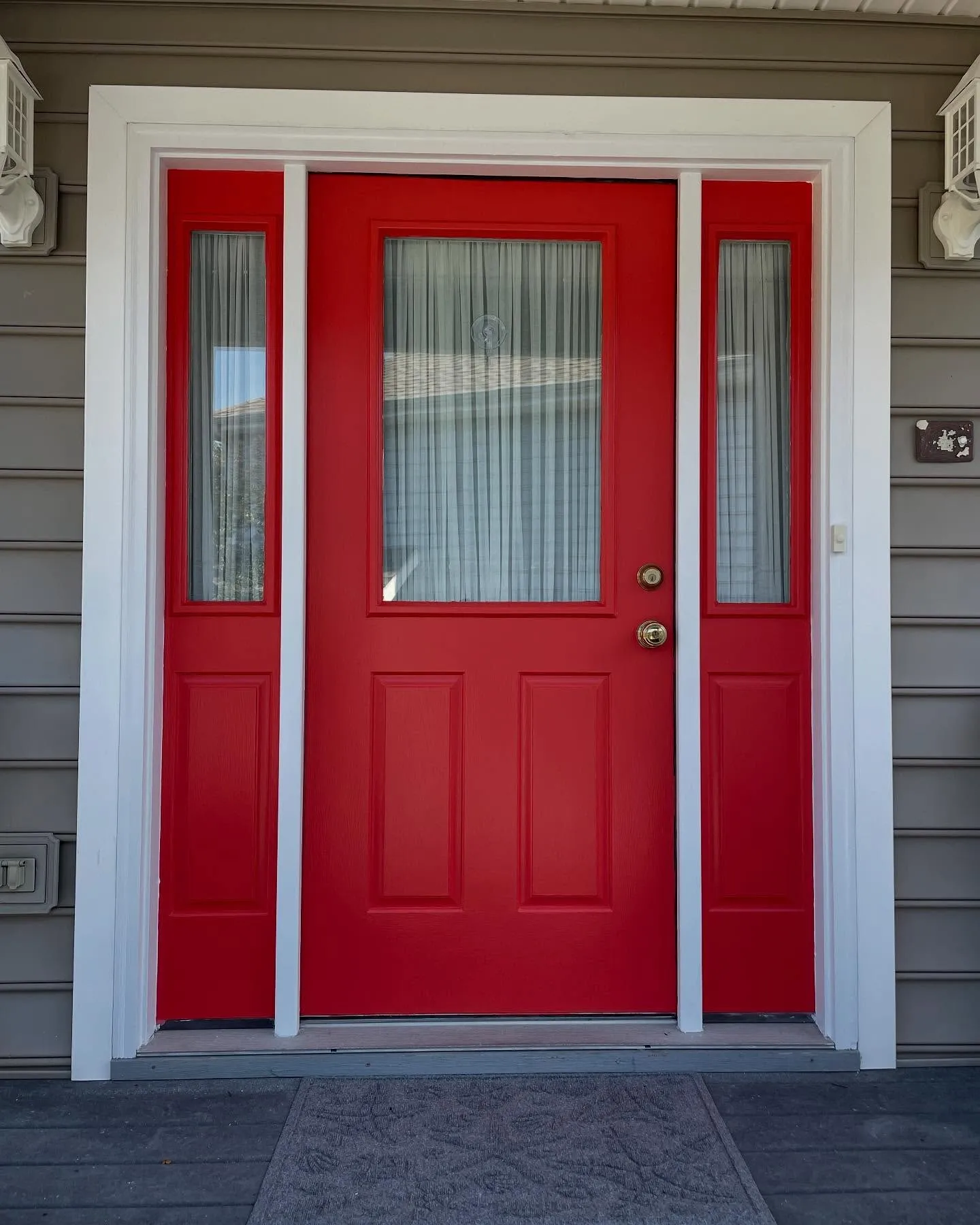 After: front door and sidelights refinished in glossy fire-engine red