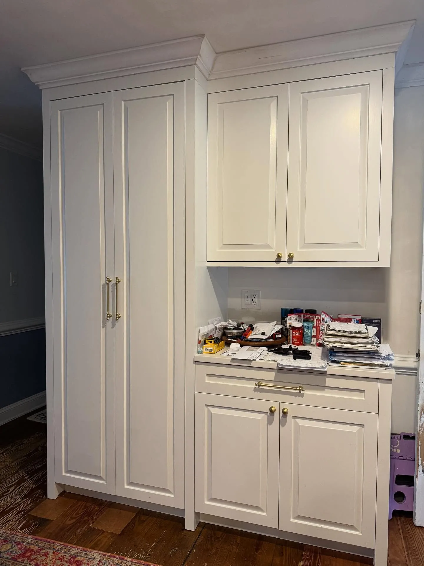 Kitchen pantry cabinets refinished in a smooth satin white